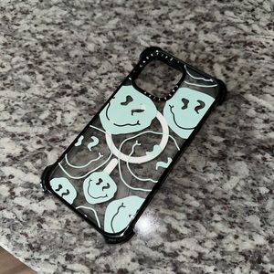 Casetify “aqua smiley transparent” iPhone 14 pro max case